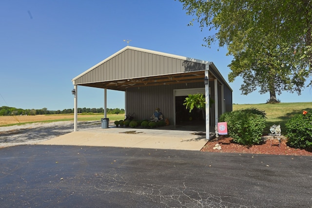 exterior space featuring a carport