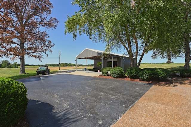 view of front facade with a carport