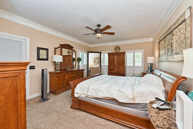 bedroom with ceiling fan, a textured ceiling, crown molding, and light carpet