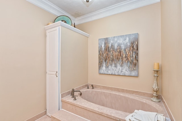 bathroom featuring a textured ceiling, a bathtub, and crown molding