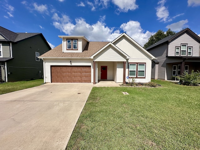 view of front of home with a garage and a front yard