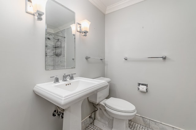 bathroom with tile patterned flooring, ornamental molding, and toilet