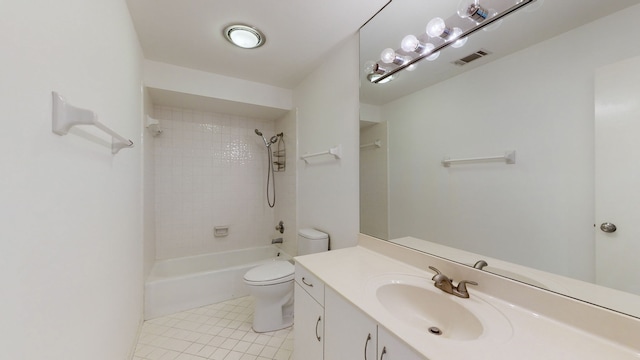 full bathroom with vanity, toilet, tile patterned floors, and tiled shower / bath combo