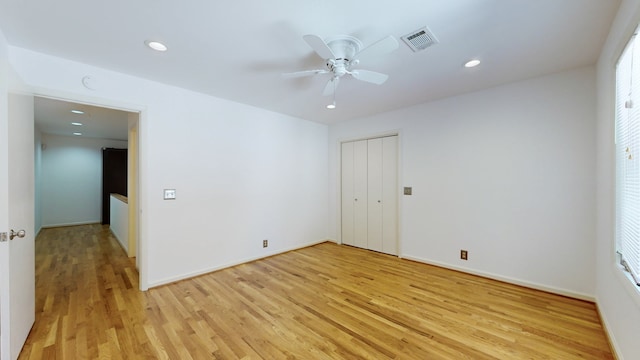 unfurnished room with light hardwood / wood-style flooring and a healthy amount of sunlight