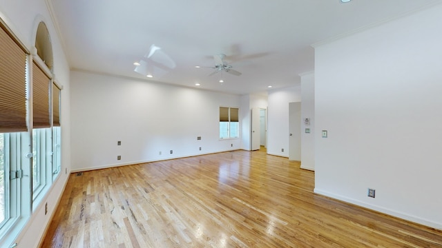 unfurnished living room with ornamental molding, light hardwood / wood-style flooring, and ceiling fan