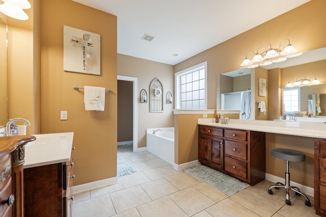 bathroom featuring tile patterned flooring, shower with separate bathtub, vanity, and a healthy amount of sunlight