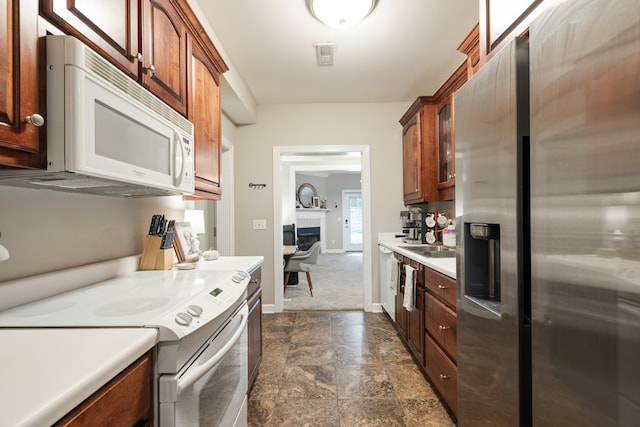 kitchen with stainless steel fridge and stove