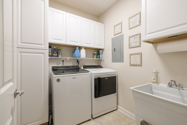 laundry room featuring sink, cabinets, separate washer and dryer, electric panel, and light tile patterned floors