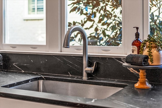 interior details with decorative backsplash and sink