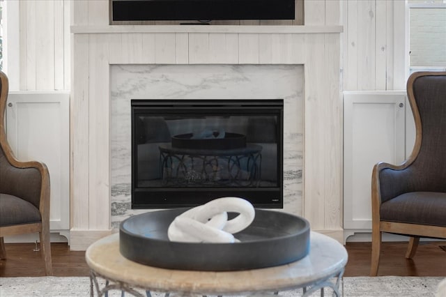 interior space with a fireplace and hardwood / wood-style floors