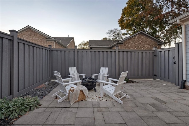 view of patio / terrace with a fire pit