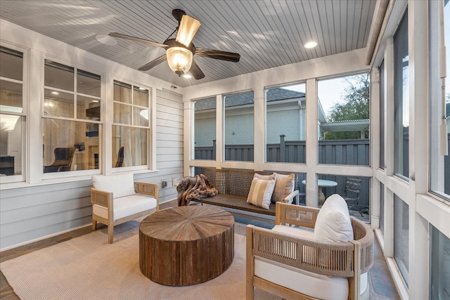 sunroom / solarium with ceiling fan