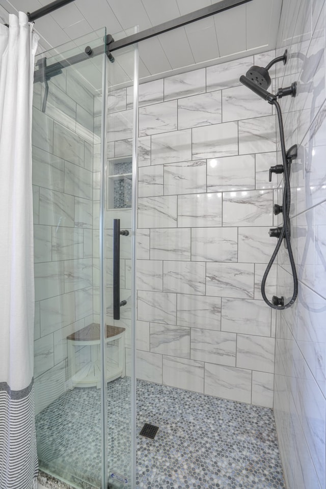 bathroom featuring a shower with curtain