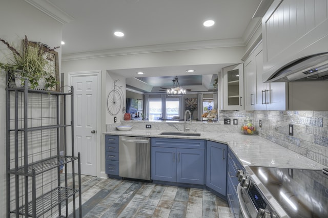 kitchen featuring tasteful backsplash, crown molding, sink, custom exhaust hood, and appliances with stainless steel finishes