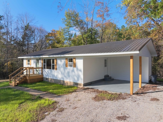 view of property exterior with a carport