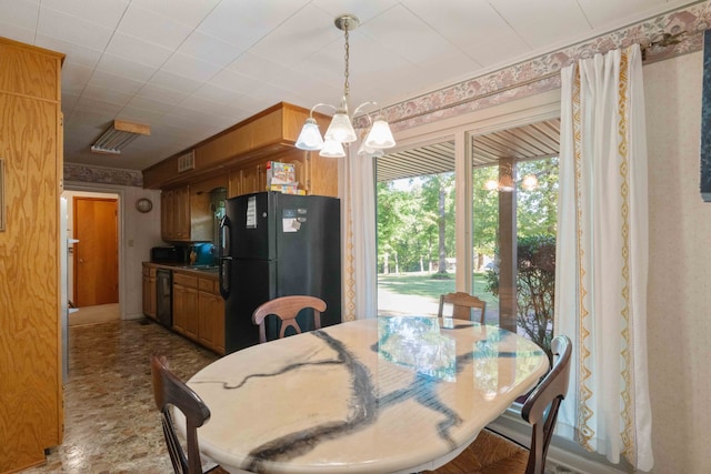 dining room with an inviting chandelier