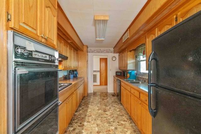 kitchen with black appliances and sink