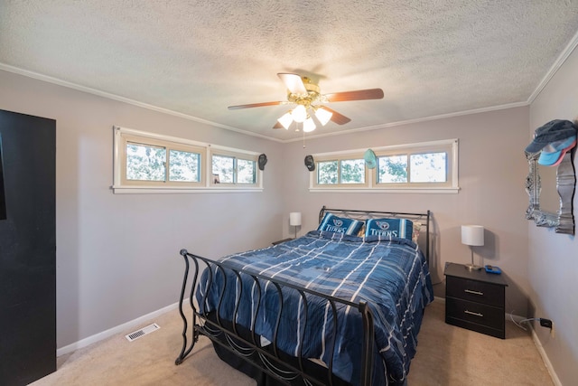 bedroom featuring multiple windows, light colored carpet, and ceiling fan