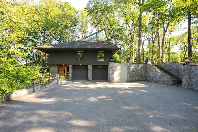 view of property exterior with a garage