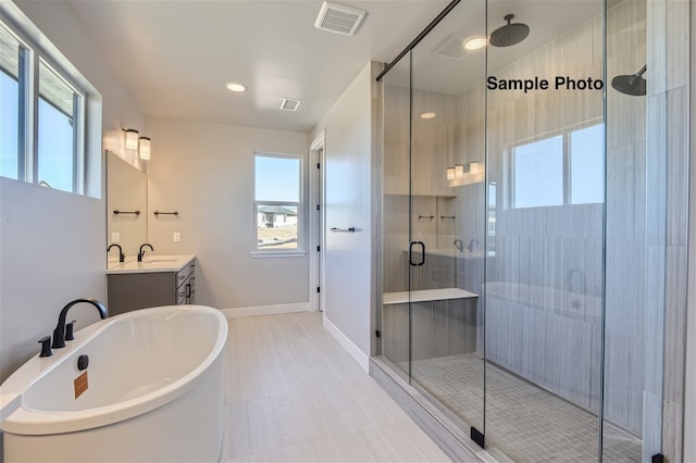 0 Keystone Dr, Pleasant View, TN 37146 - bathroom with vanity, separate shower and tub, tile patterned floors, and plenty of natural light
