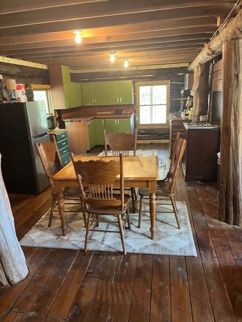 dining space with dark wood-type flooring