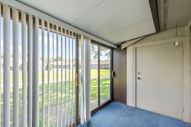 unfurnished sunroom featuring a wealth of natural light