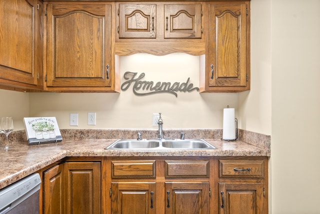 kitchen with white dishwasher and sink