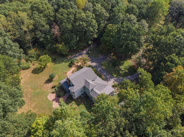 bird's eye view featuring a view of trees