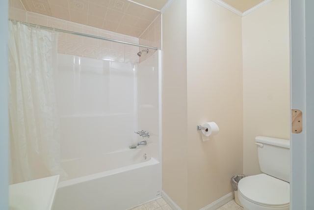 bathroom with shower / bath combo, baseboards, ornamental molding, toilet, and tile patterned floors
