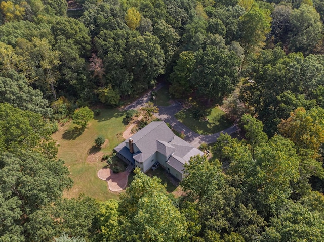 aerial view featuring a view of trees