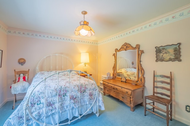 bedroom with baseboards and carpet floors