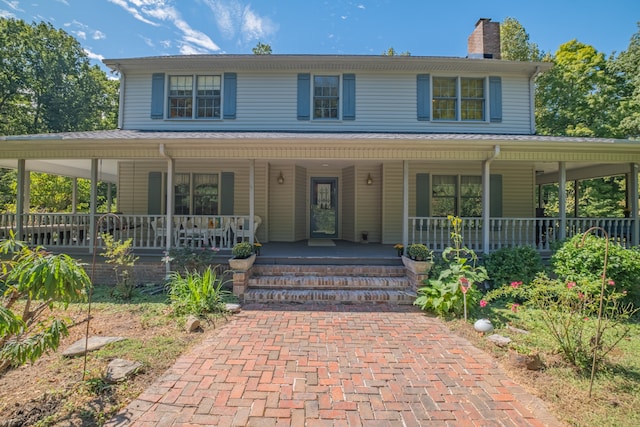 country-style home with covered porch