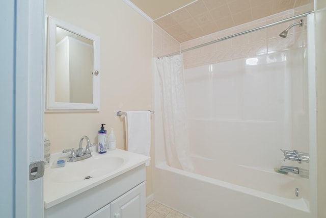 full bathroom with tile patterned floors, shower / bath combo with shower curtain, and vanity