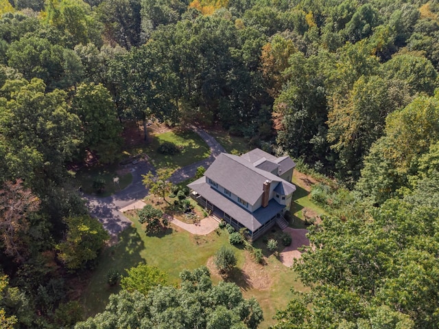 drone / aerial view with a forest view