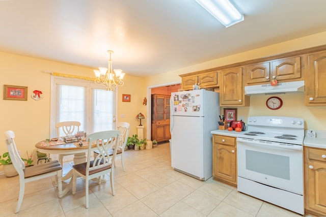 kitchen featuring hanging light fixtures, white appliances, light tile patterned flooring, and a notable chandelier