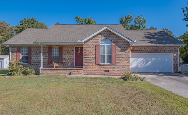 view of front facade with a garage and a front yard