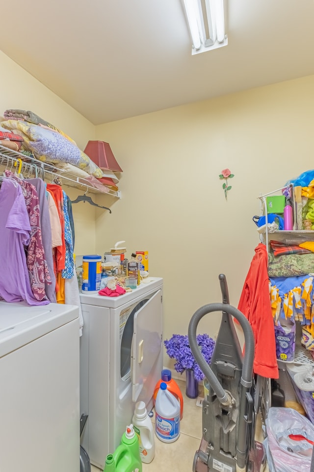 washroom with washer and dryer