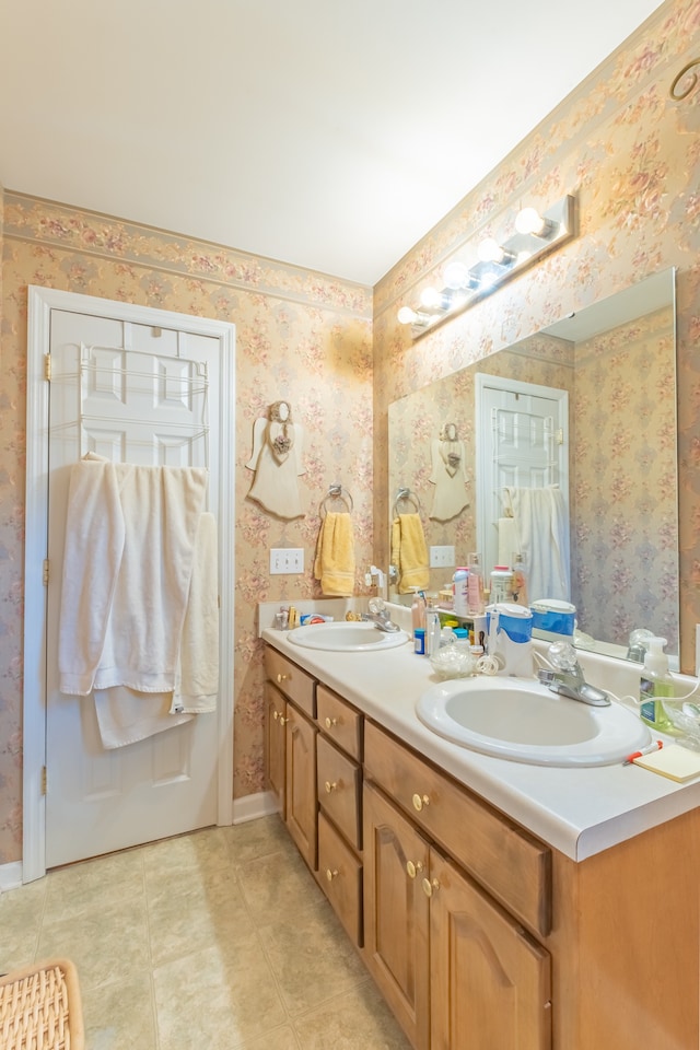 bathroom featuring tile patterned floors and vanity