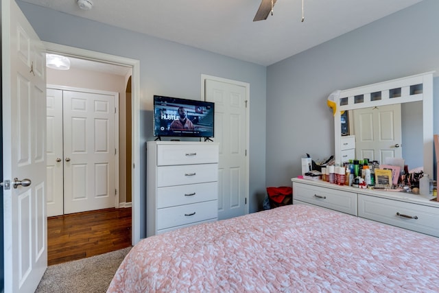 bedroom featuring ceiling fan and hardwood / wood-style flooring