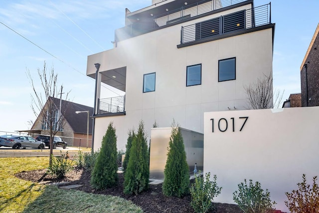 view of home's exterior with stucco siding