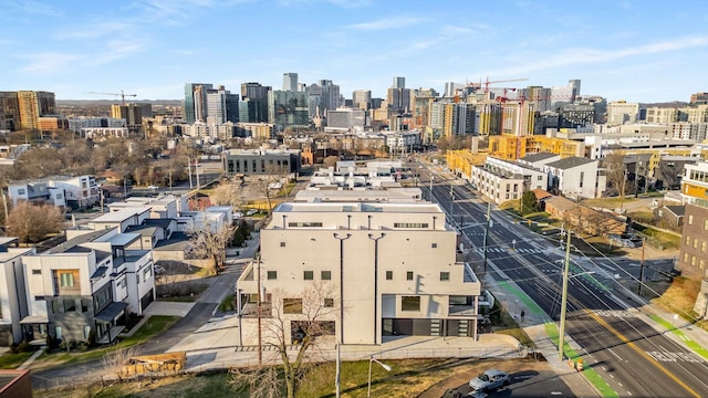 birds eye view of property with a view of city