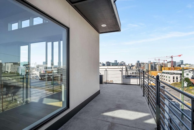 balcony featuring a city view