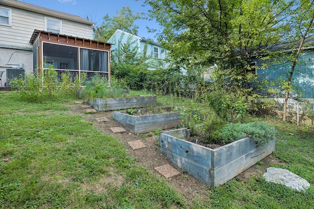 view of yard with a sunroom