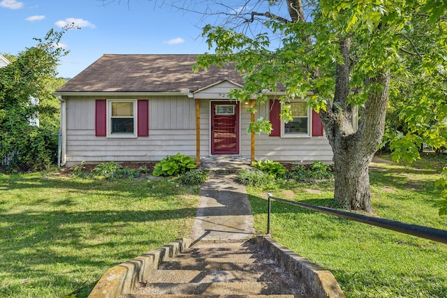 view of front of home with a front yard