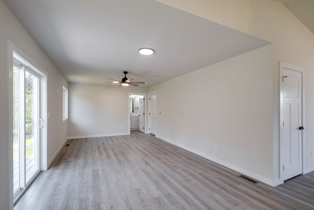 unfurnished room with ceiling fan and light hardwood / wood-style floors