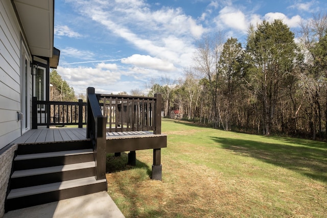 view of yard featuring a wooden deck