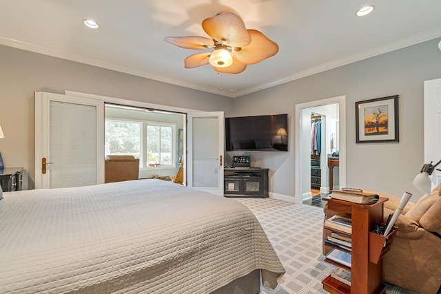 carpeted bedroom featuring crown molding, ensuite bathroom, and ceiling fan