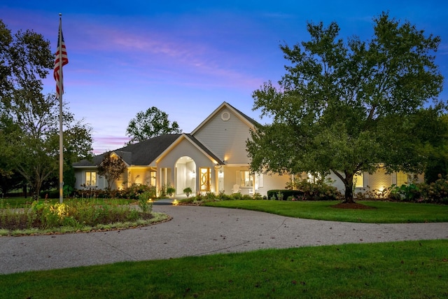 view of front of house with a lawn