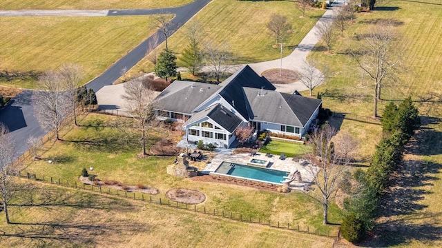 birds eye view of property featuring a rural view