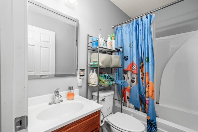 full bathroom featuring vanity, toilet, and shower / tub combo with curtain